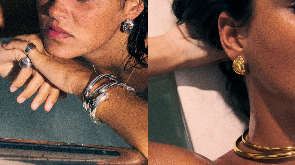 Summer jewelry stacking tips featuring silver rings and gold earrings for a stylish look.