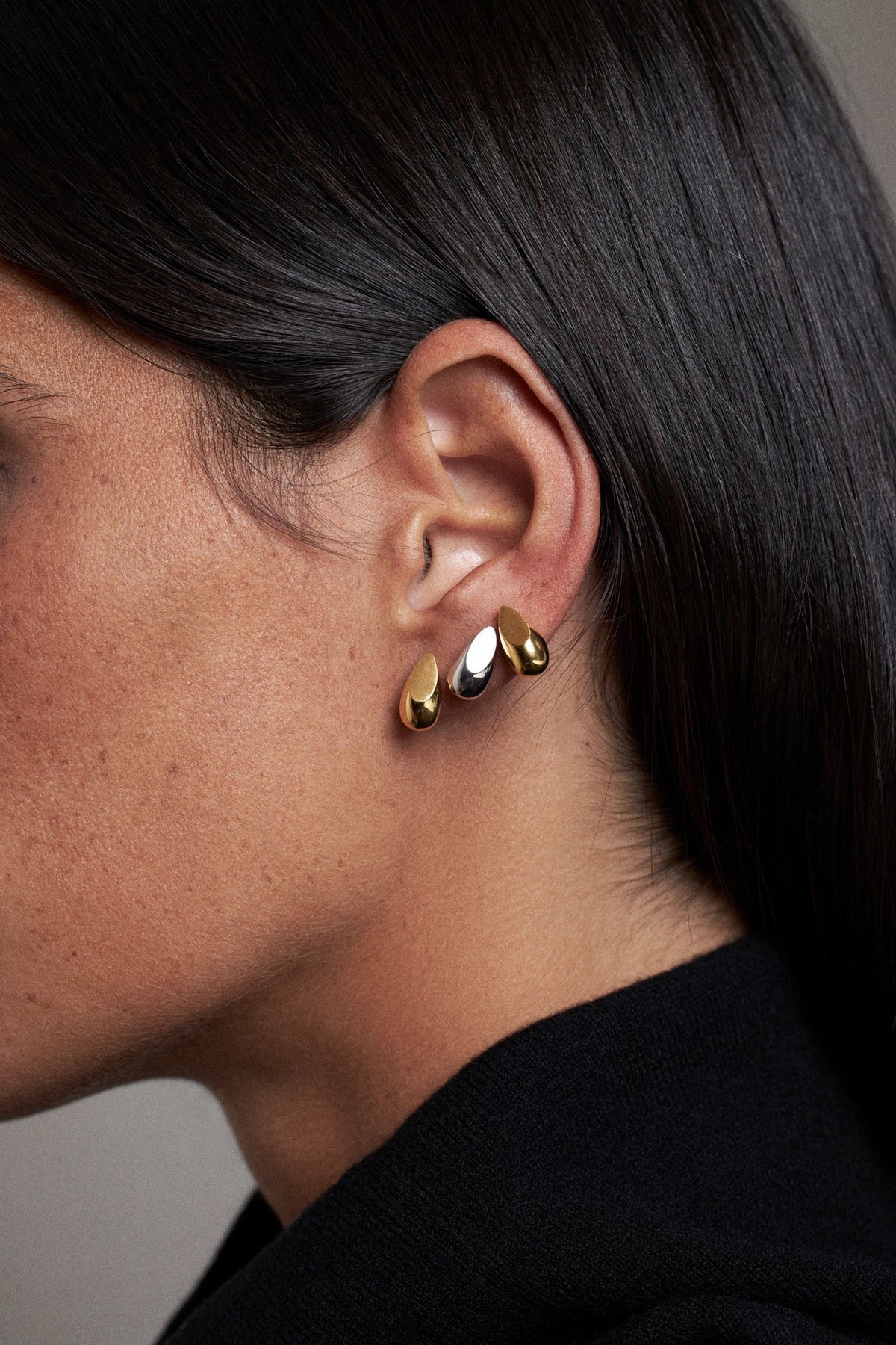 Elegant earrings featuring gold and silver elements, ideal for the best jewelry for bridesmaids.