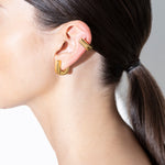 model wearing fiona huggies in gold