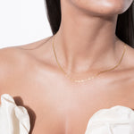 model wearing isa choker in gold