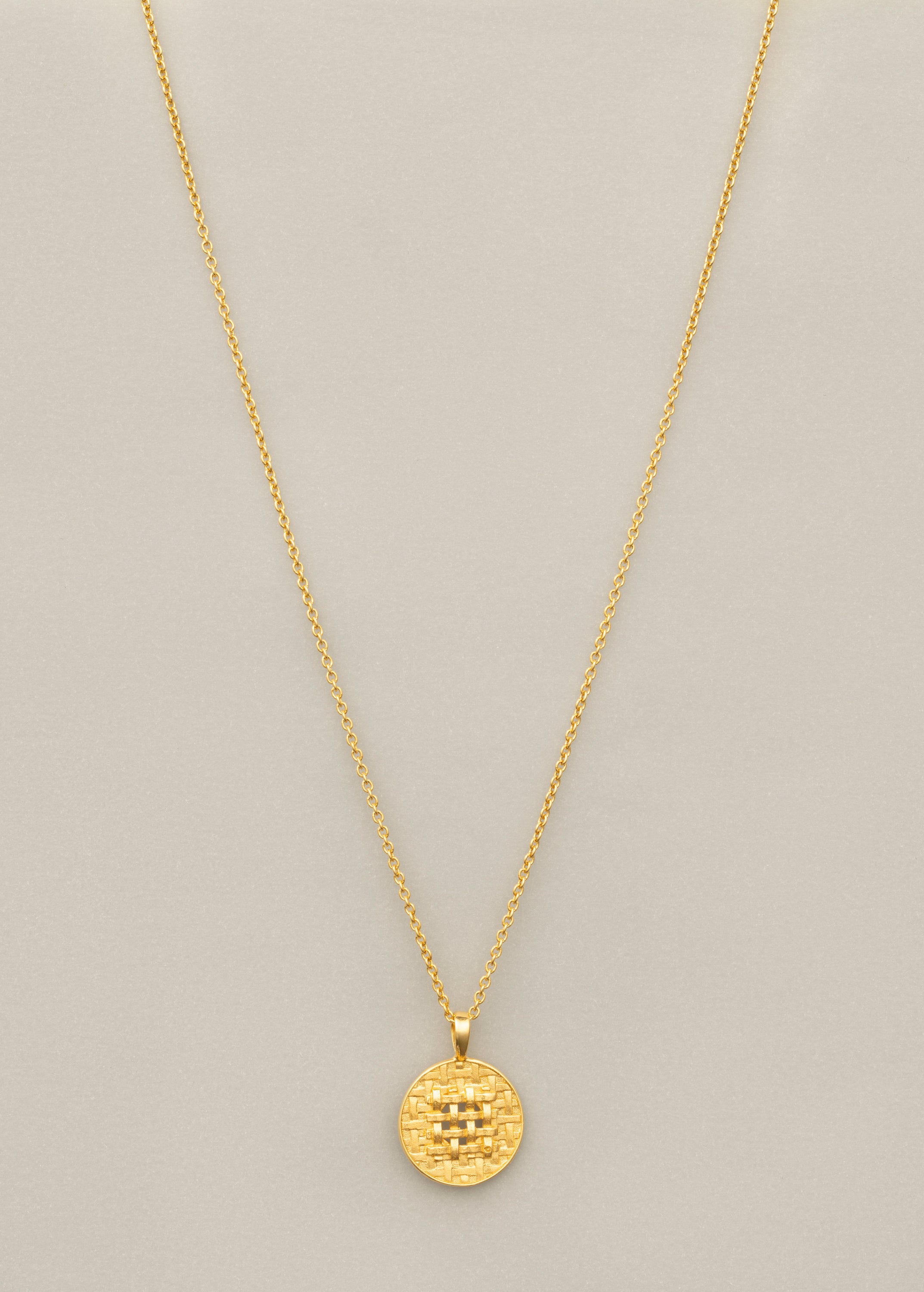 ser necklace in gold