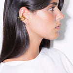 model wearing charli earcuff in gold