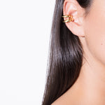 model wearing bella earcuff in gold