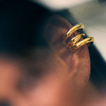 model wearing charli earcuff in gold
