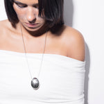 model wearing cheri long necklace in silver