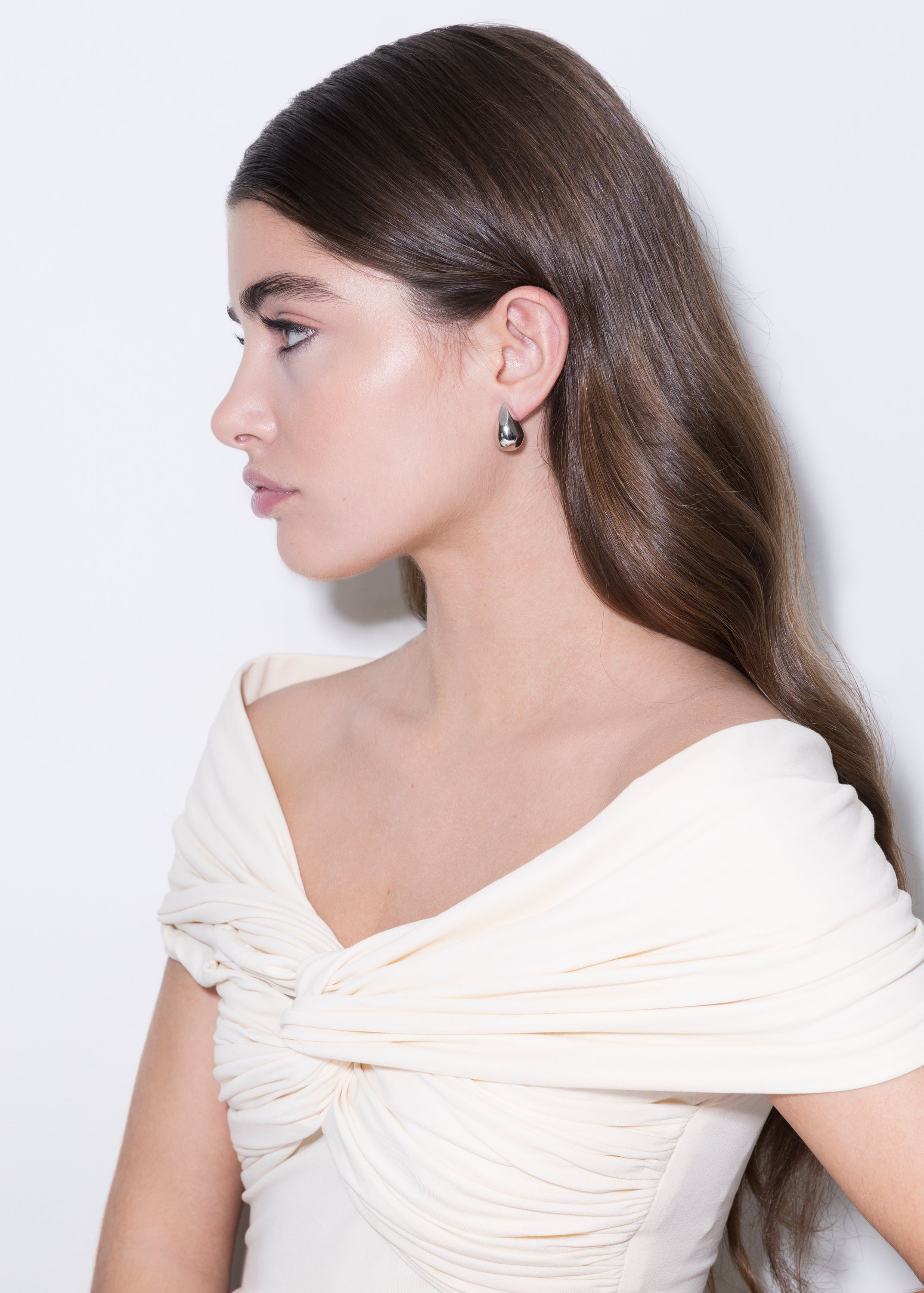 model wearing constantin earrings in silver