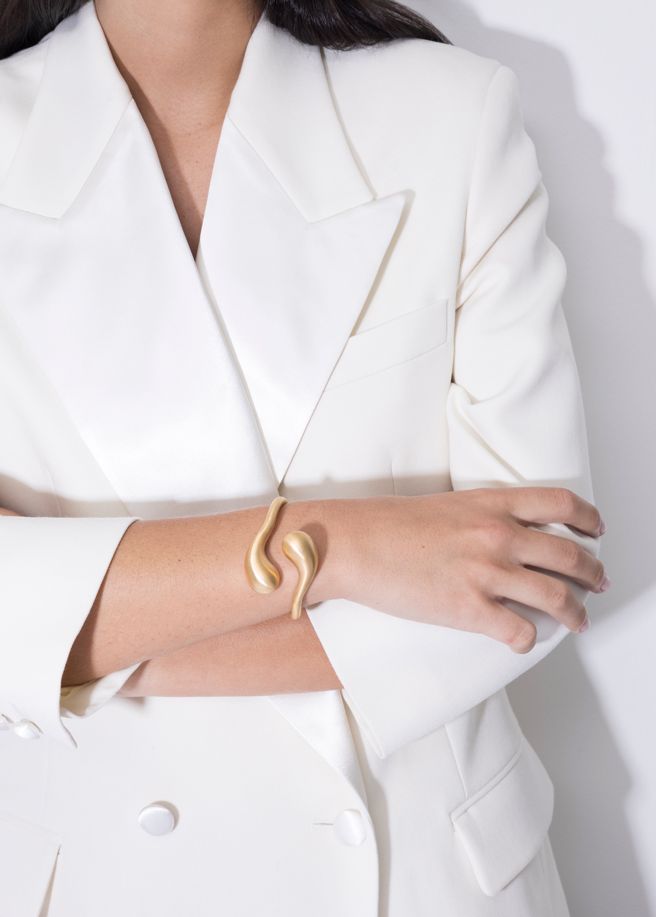 model wearing florence bracelet in gold