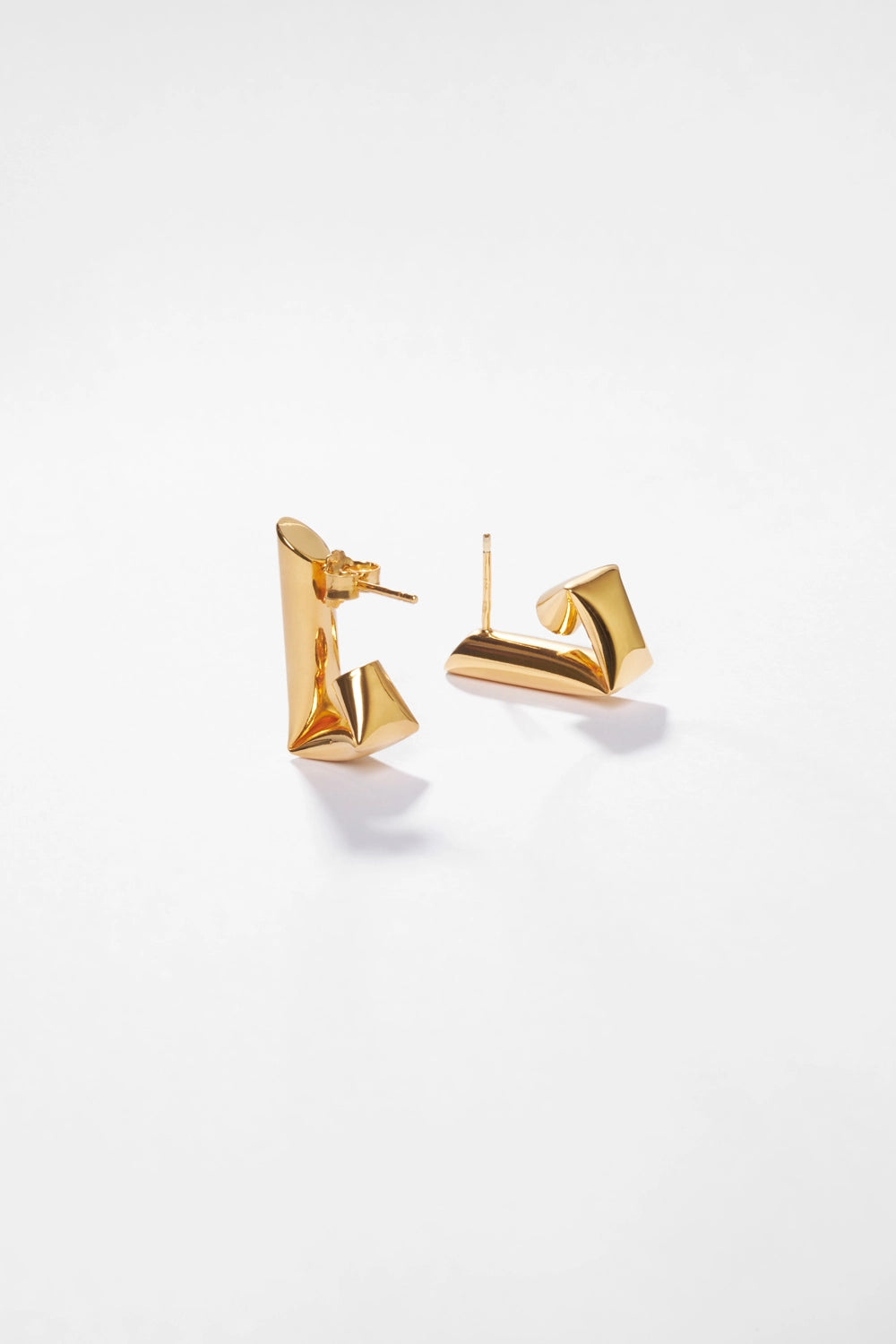 tina huggies earrings