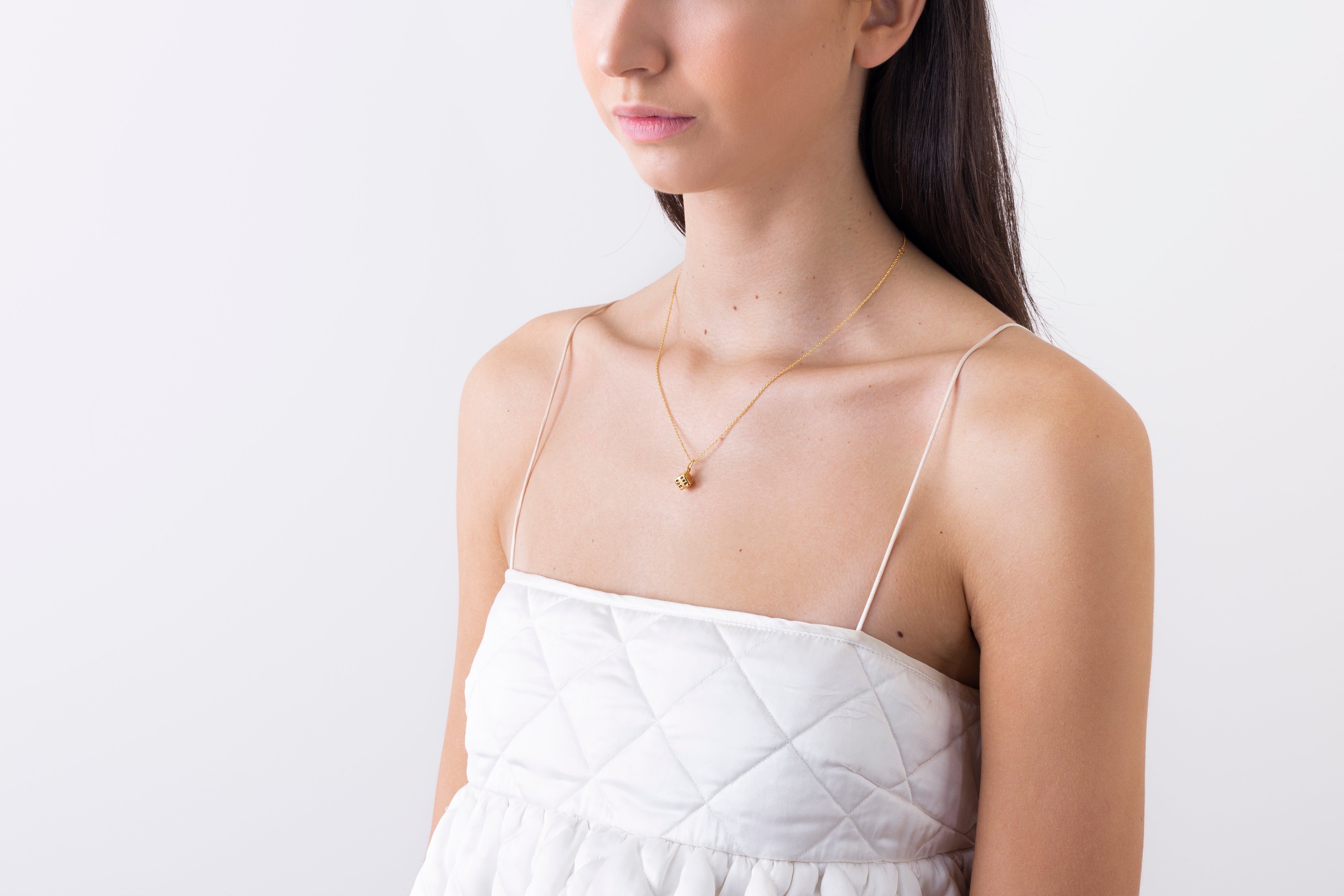 model wearing victoria necklace in gold